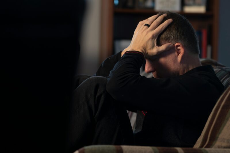 Man with his head in his hands